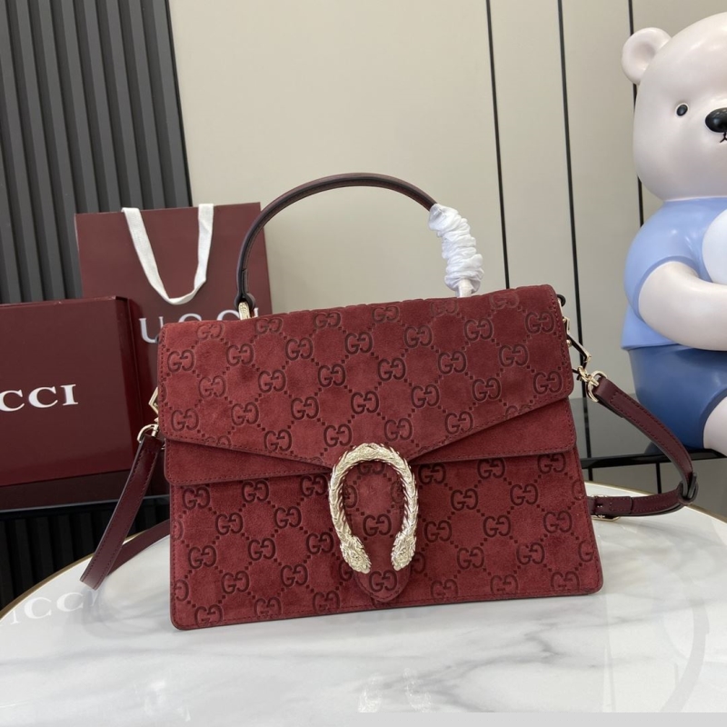 G*u*i top handle bags